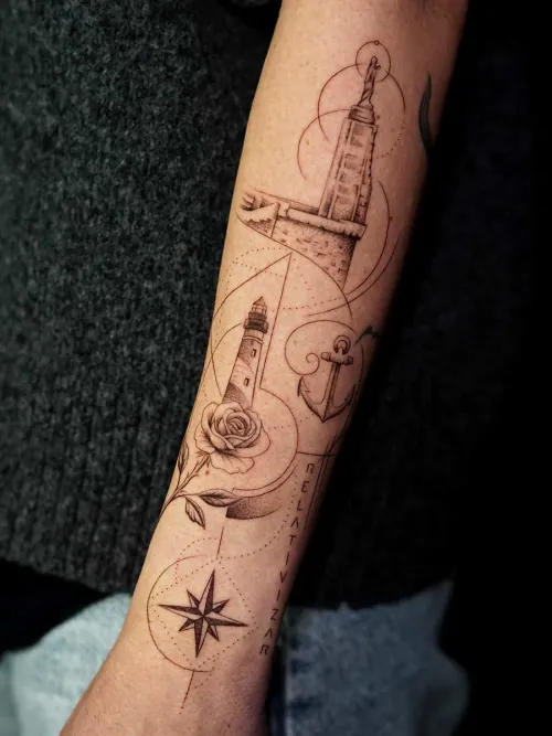Fine line micro-realism forearm tattoo with lighthouse, anchor and compass rose